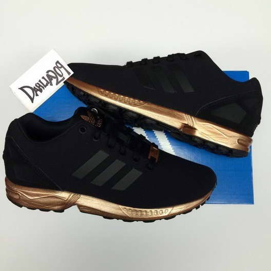 zx flux noir gold